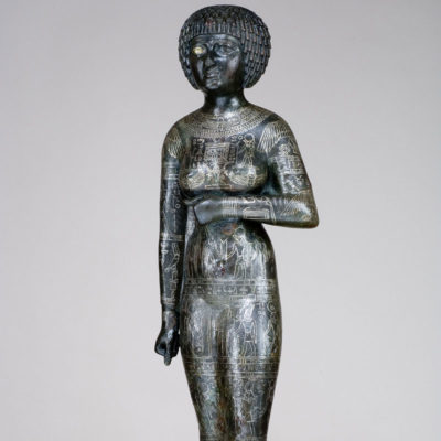 Copper alloy hollow cast statue of the princess-priestess Takushit. Late period, Dynasty XXV (712-664 BC.). 