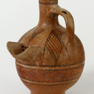 Phoenician jug of Bichrome Pottery,  imported to the island before the intrusion of the Phoenicians. On the belly, a strainer-spout. Cypro-Geometric ΙΙ period. 950-900 B.C.