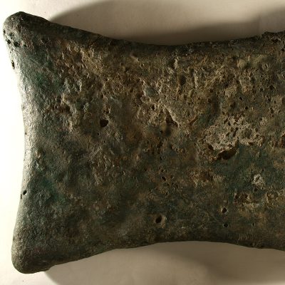 Copper ingot in the shape of an ‘oxhide’, a type widely found throughout the Mediterranean from the 16th to the 11th c. BC . (14729)
