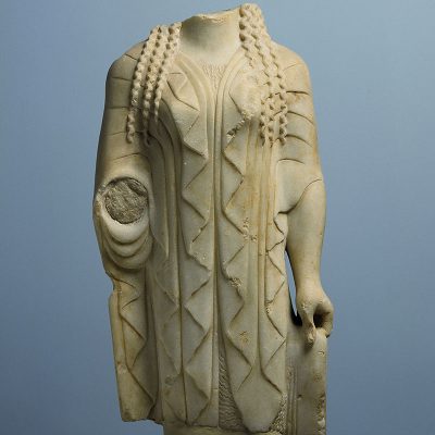 26
Marble statuette of kore (maiden) from Eleusis.
ca. 500 BC.