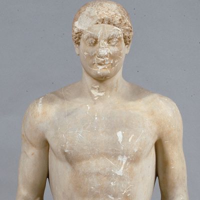 3938   Marble funerary kouros from Mesogeia, Attica. ca. 500 BC