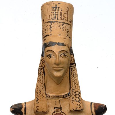 Boeotian plank-shaped clay figurine. From Tanagra. 575-550 B.C. (A 4009)