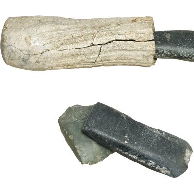 Stone tools, one of them preserves its bone handle.