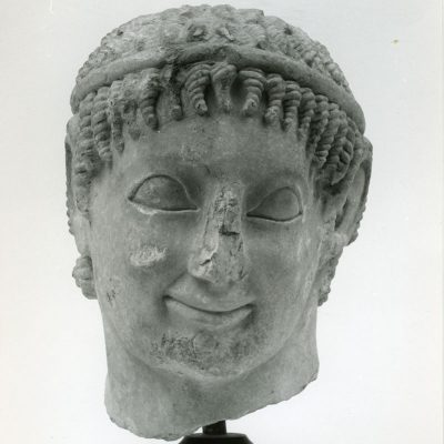 61
Marble male head, probably from a statue of a riding youth, found at Eleusis, Attica.
ca. 560 BC.