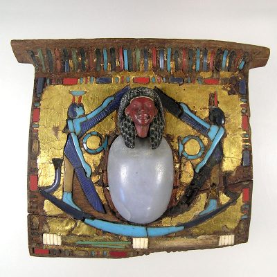 Temple-shaped pendant of a mummy. Gilt wood with various inlaid semi-precious stones. New Kingdom, Dynasties ΧVIII-XIX (1552-1186 BC).