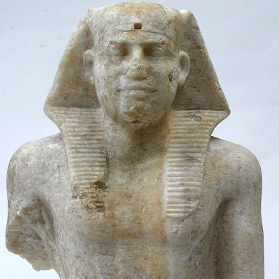 Upper part of a Pharaoh statue. Alabaster. Ancient Kingdom. Dynasties IV-VI (2575-2155 B.C.).